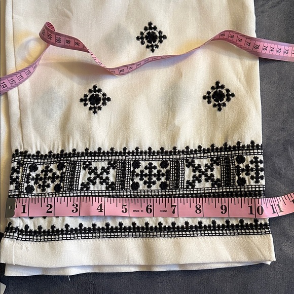 The COMMENSE 
OFF White Pants with Black Embroidery - Picture 8 of 9